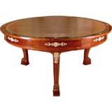 A French Empire Style Ormolu-Mounted Mahogany Revolving Center T