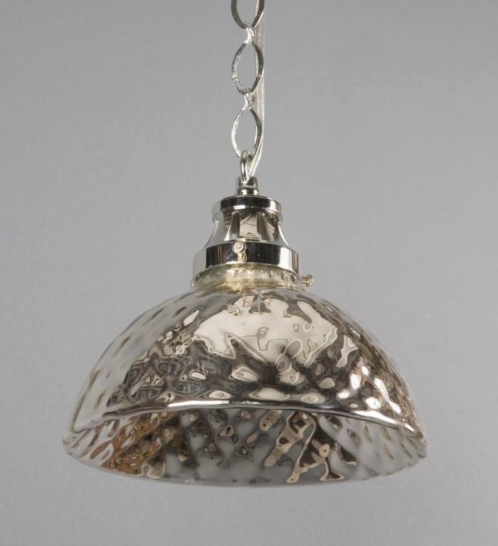 A quilted mercury glass pendant fixture on custom made, solid brass fittings finished in a dark, wax-rubbed brown patina or polished nickel finish.  The fittings for this fixture are custom made by the Remains Lighting workshop. Due to the antique
