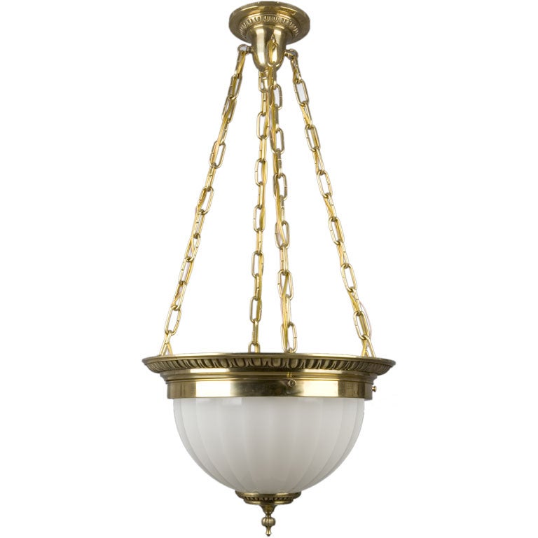 A cast glass inverted dome chandelier