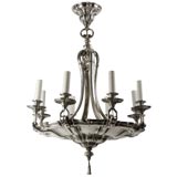 A bronze silverplated eight-light chandelier