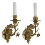 A pair of gilt sconces