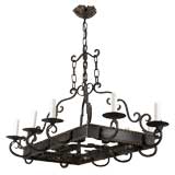 A ten light iron chandelier