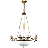 An eight light gilded bronze chandelier by Sterling Bronze Co.