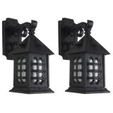 Antique A pair of black cast iron exterior sconces