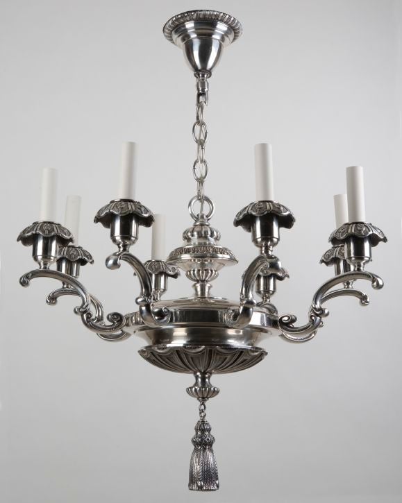 An eight arm silver chandelier