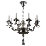 An eight arm silver chandelier
