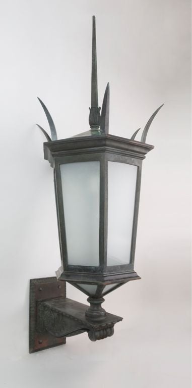 A pair of verdigris bronze exterior lanterns by E. F. Caldwell