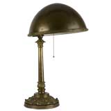 A brass desk lamp