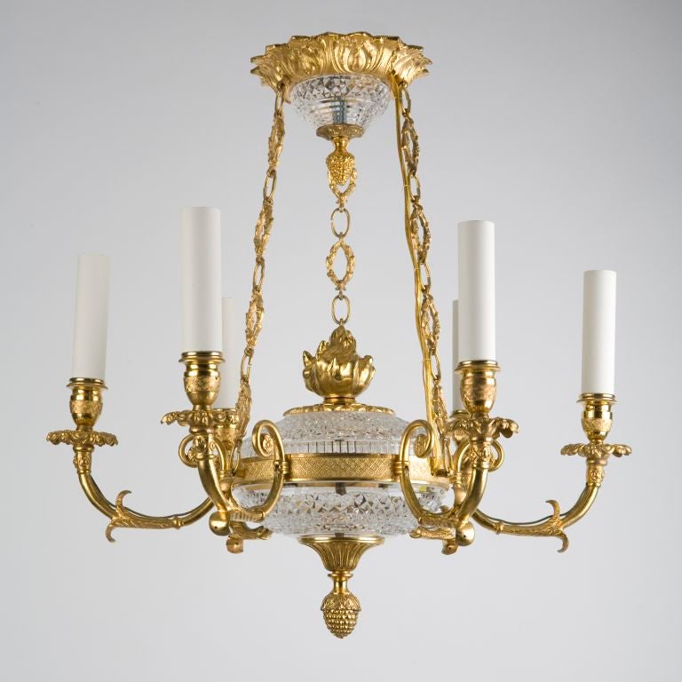 A small crystal and gilt bronze six arm chandelier