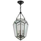 A blackened brass and beveled glass lantern