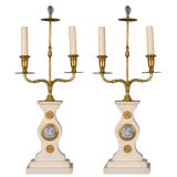 A pair of candelabras by the EF Caldwell Co
