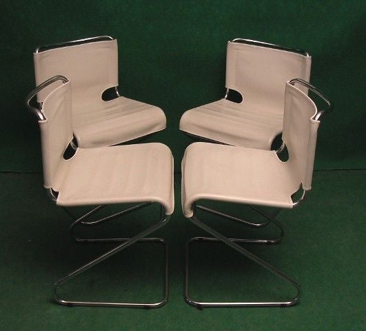 Set of 4 White Sky Chairs.