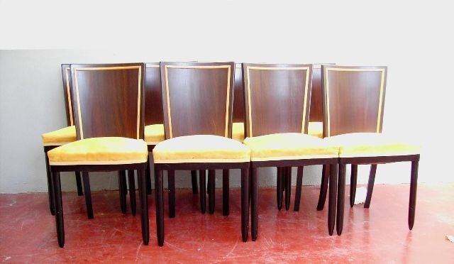 8 Chairs by Borsani.