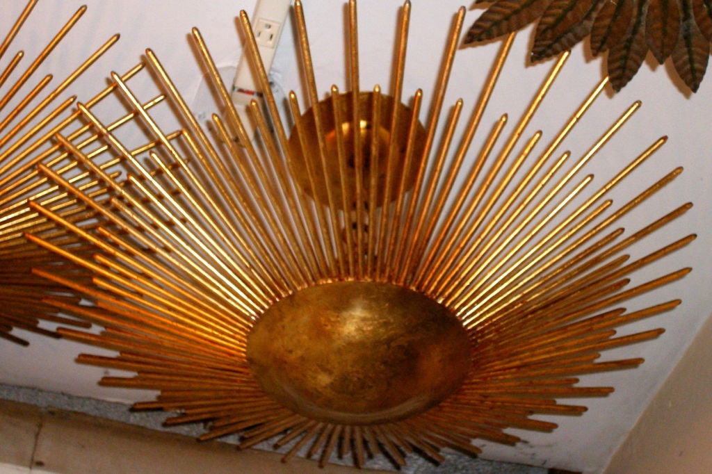 Pair of Large Gilt Metal Sunburst Light Fixtures, Sold Individually In Good Condition For Sale In New York, NY