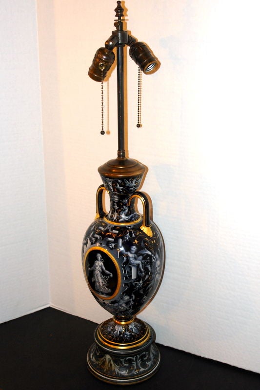 A 19th century French porcelain vase mounted as a lamp. 

Measurements:
Height: 19