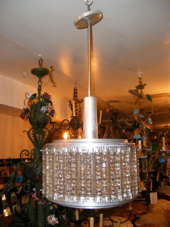 A circa 1940s Italian molded glass light fixture with interior lights. With frosted glass bottom and four interior Edison sockets. 

Measurements:
Diameter 15