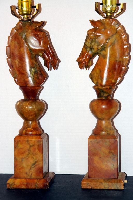 Pair of Italian carved alabaster table lamps in the form of horses, circa 1930s

Measurements:
Height of body 16