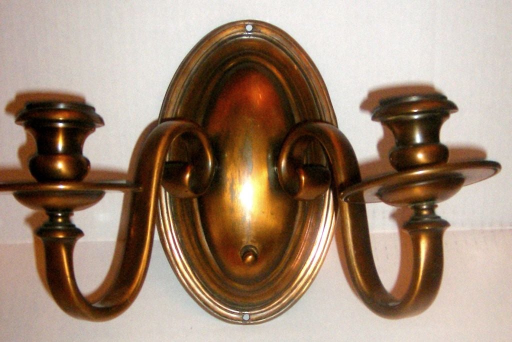 A pair of 1920s American copper sconces with original patina, double light.