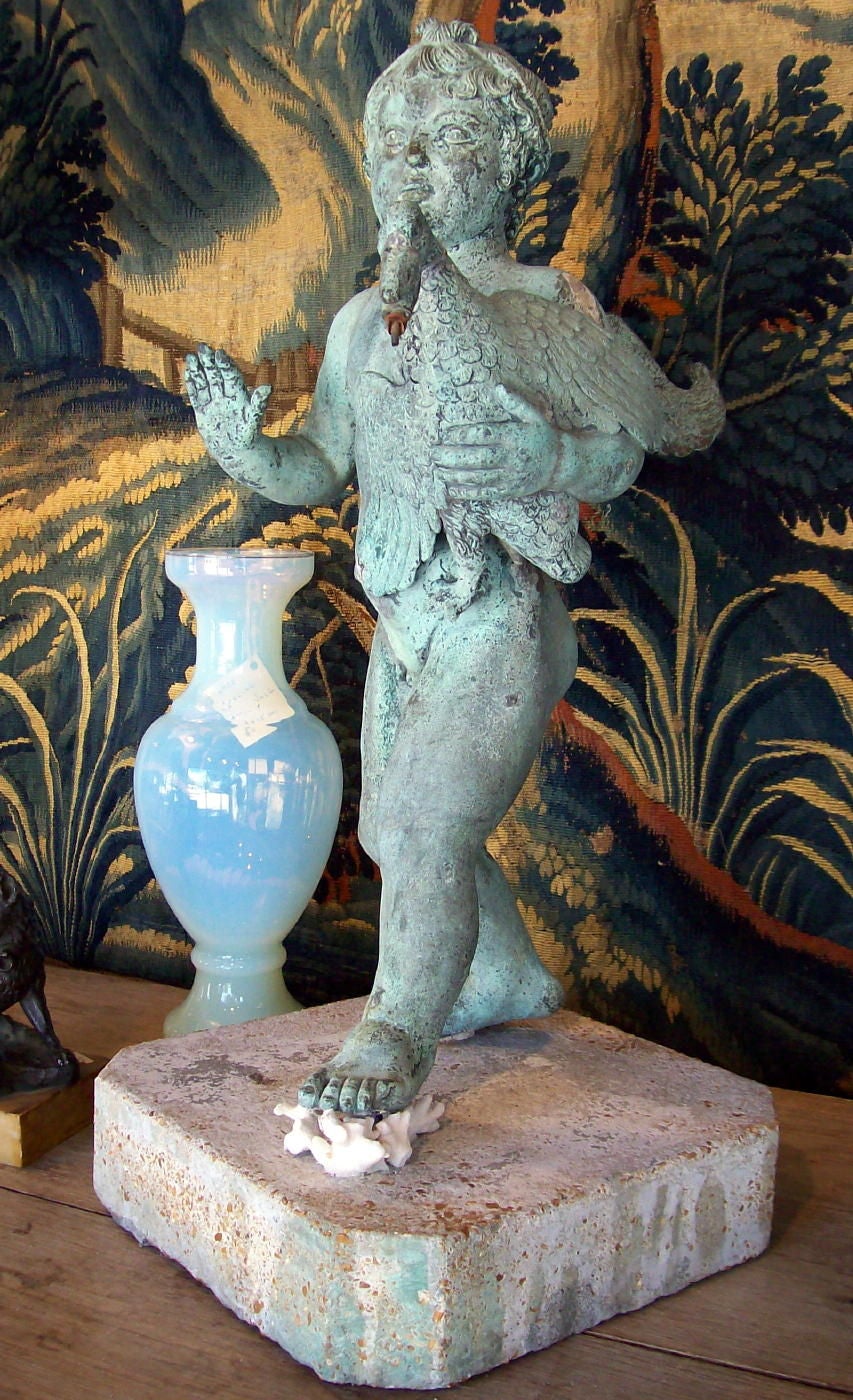 BRONZE BOY WITH SWAN SCULPTURE