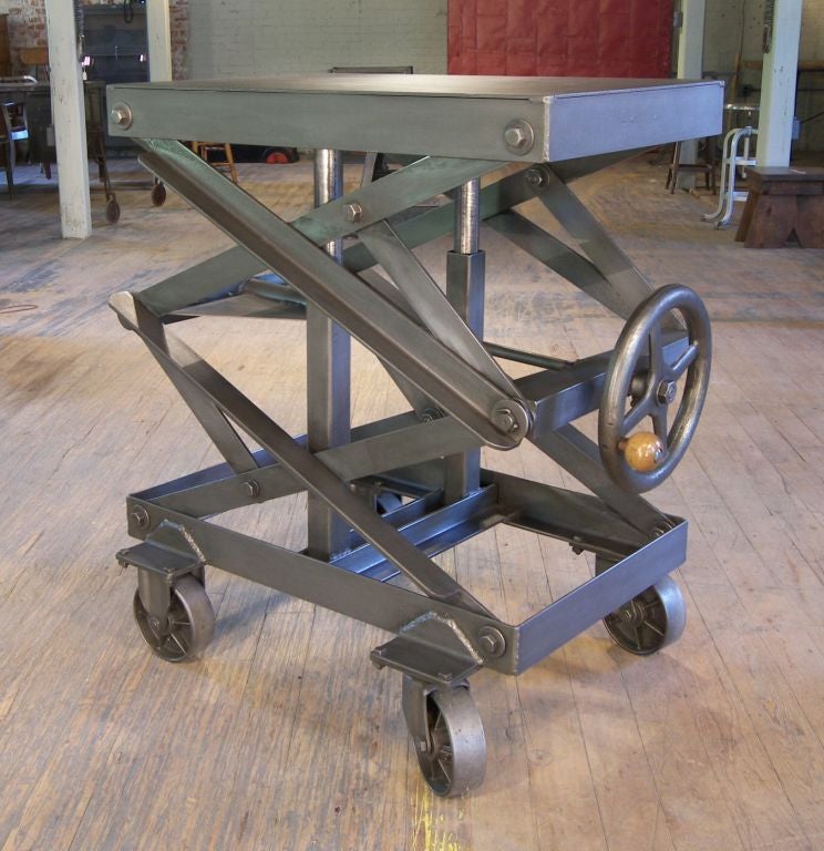 Industrial Adjustable Scissor Lift Table.  Height is adjustable from 26 1/2