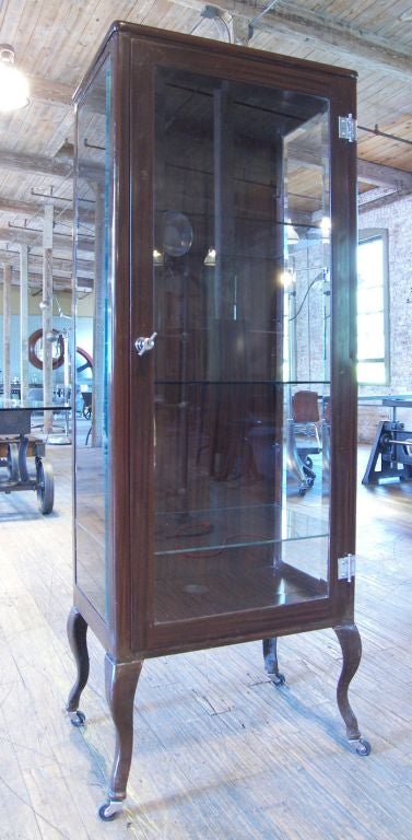 Vintage Metal Medical Cabinet on wheels. Beveled Glass.  Inside Dimensions are 23 3/4