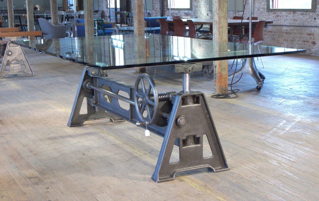 Dining-table base is an adjustable cast-iron machine table that would have been found in the factories of the early 1900s. The crank wheel on the side controls the table height from 26.5″ – 32″. Table is shown with 3/4