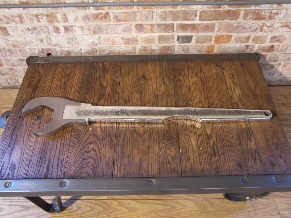 Industrial vintage aluminum and steel wrench, art prop.