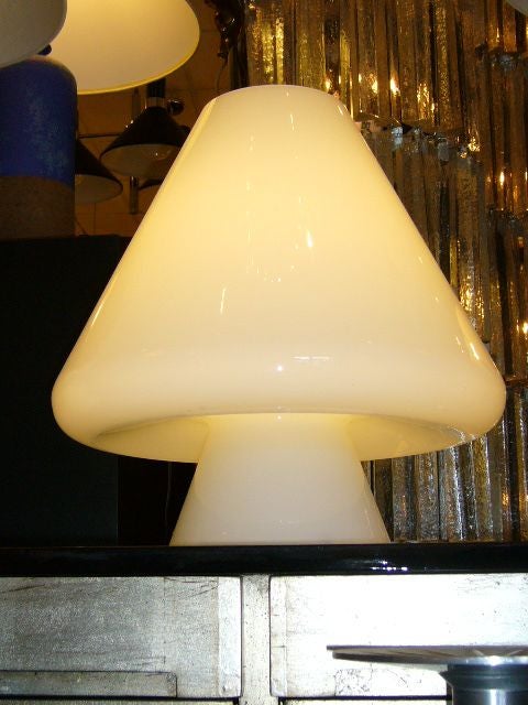 SOLD SEPTEMBER 2011..Large one piece sculptural and modern de Majo blown cased thick glass table lamp in a most interesting form. Started in 1947 by Guido De Majo, this Murano glass blowing firm is synonymous with modern Murano style.  Single socket
