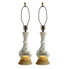 PAIR OF OPALINE GLASS LAMPS WITH CRESTS