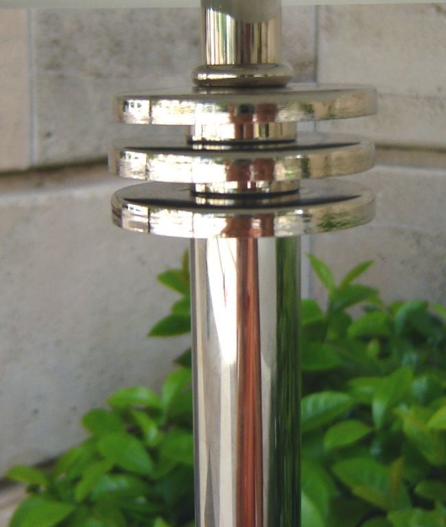 This American art deco table lamp was designed and produced in the 1930s by the Markel Company of Buffalo, New York. The three “speed” rings on the shaft are echoed in the typical Markel finial. This is the largest and most impressive of the Markel