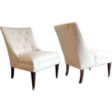 1940's slipper chairs with carved wood legs and brass sabots.