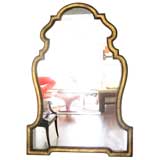 Large glamorous mid-century Cartouche giltwood and glass mirror.