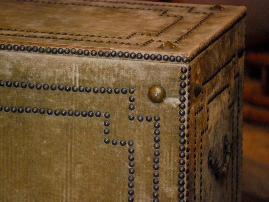 French upholstered trunk with nail head design