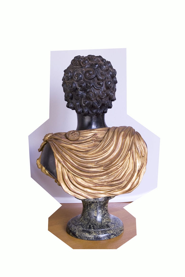 Classic design with a bit of glam thrown in with this Roman man’s robe parcel gilt to create a chic statement in the most traditional or contemporary of spaces; perfect on a table or pedestal.