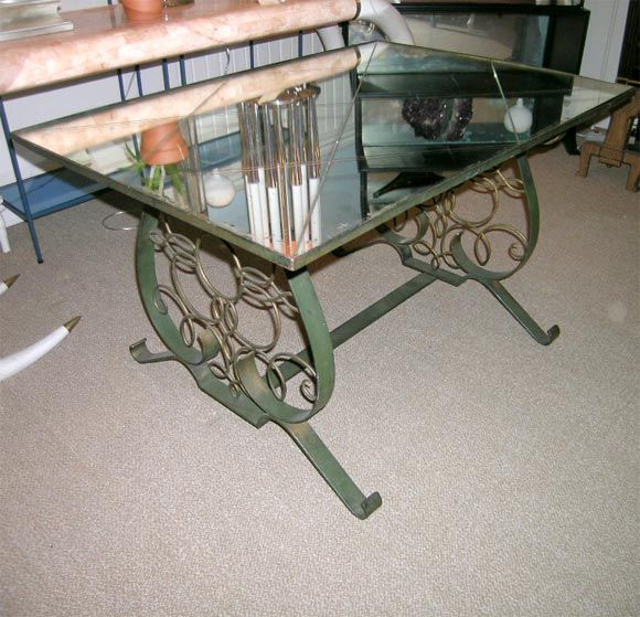 An Artistic Iron and Mirrored Table