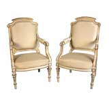A Pair of Italian Fauteuils part  of a Suite of Eight