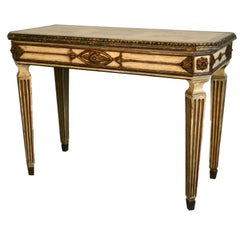 An Italian Neoclassical Painted 
Parcel Gilt Console
