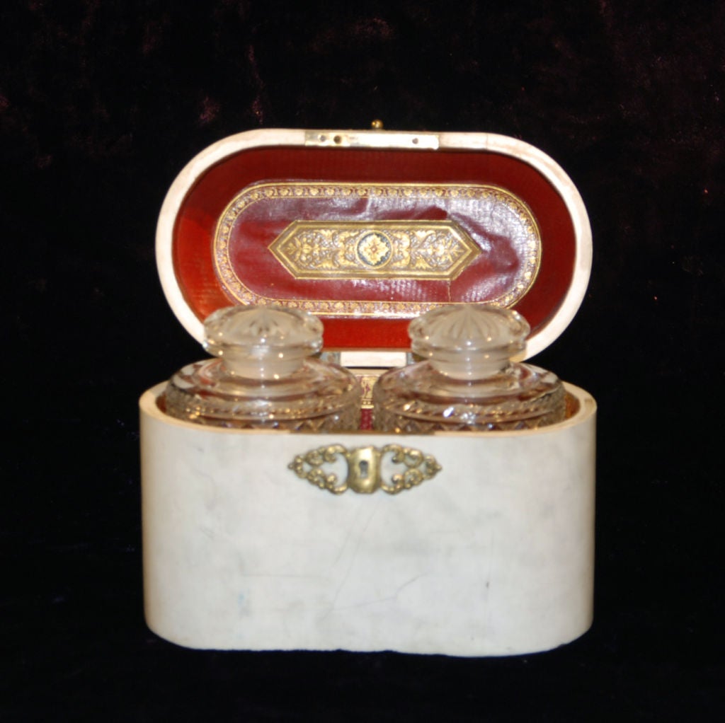 A Leather box with two decanters inside