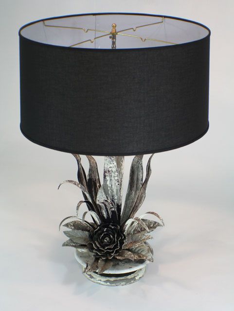 A sculptural large scale Toile lamp with metal flower and leaves