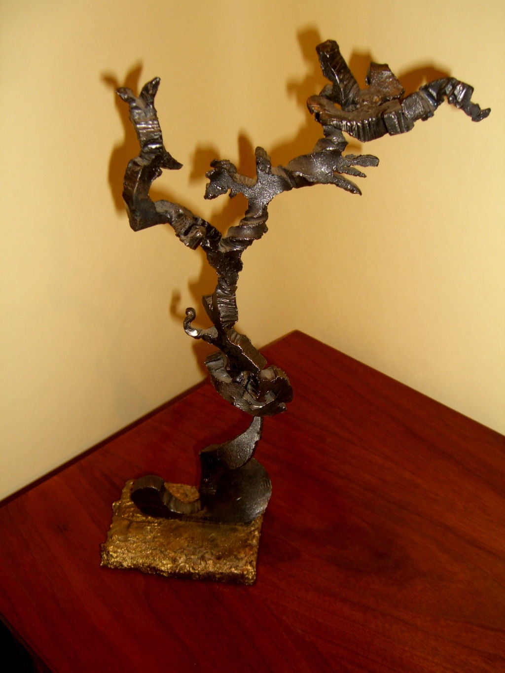 A nice Iron and Bronze abstract sculpture by Karl Fischer. Karl Fischer was a talented art blacksmith who made a career out of fashioning hunks of unassuming metal into critically-acclaimed sculptures, furniture and other handcrafted objets