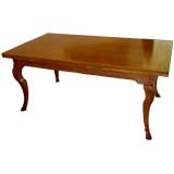 A limed oak dining table w/ hoof feet  the manner of Andre Arbus
