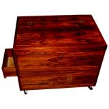 Bruksbo Bagn Norwegian Rosewood bar on casters of coffee table