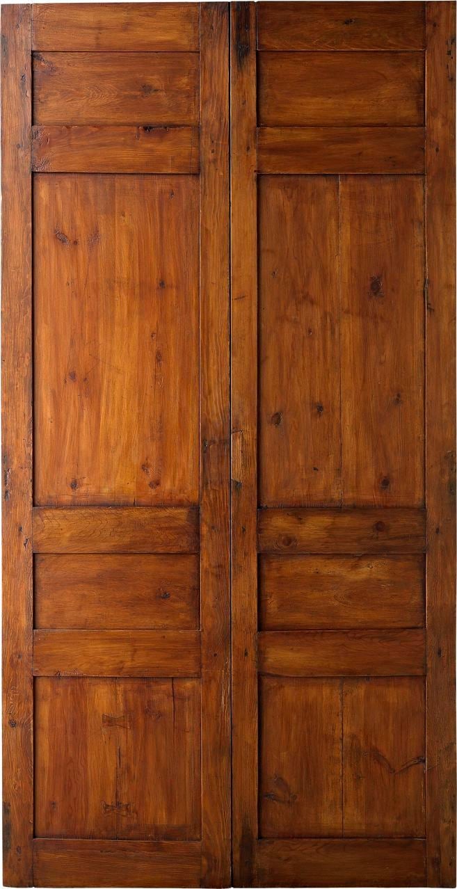 A pair of 18th century antique doors from Spain with handcarved Gothic panels.<br />
Reference # PN 2807 www.porteradoors.com