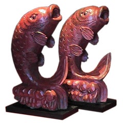 (2) set of solid teak carved fish figures