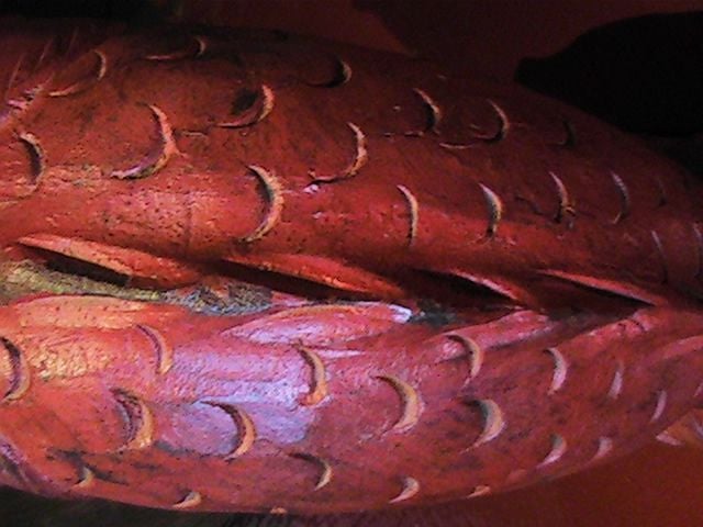 red lacquer on black wooden base.  very heavy, in queue to become set of table lamps.  please call immediately if interested in them as sculpture.