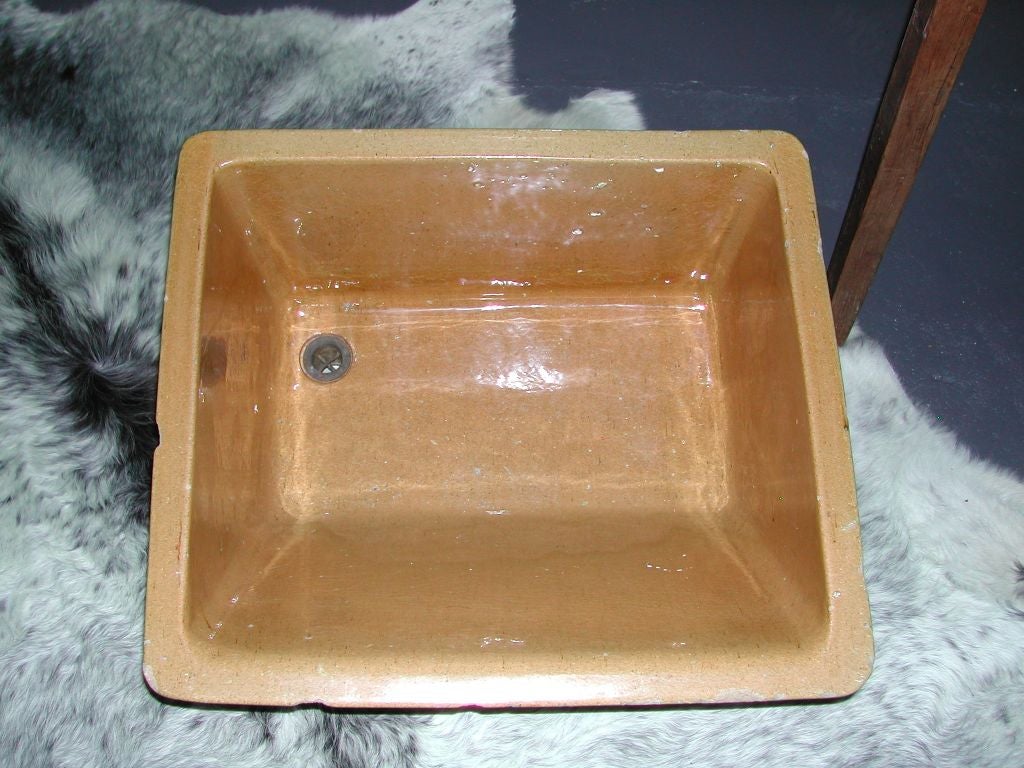 beautiful, glazed burnt saffron sink with gladding mcbeane stamp.  amazing find, i have never seen one of these sinks.  new and improved price from $3400.  esoteric collector.