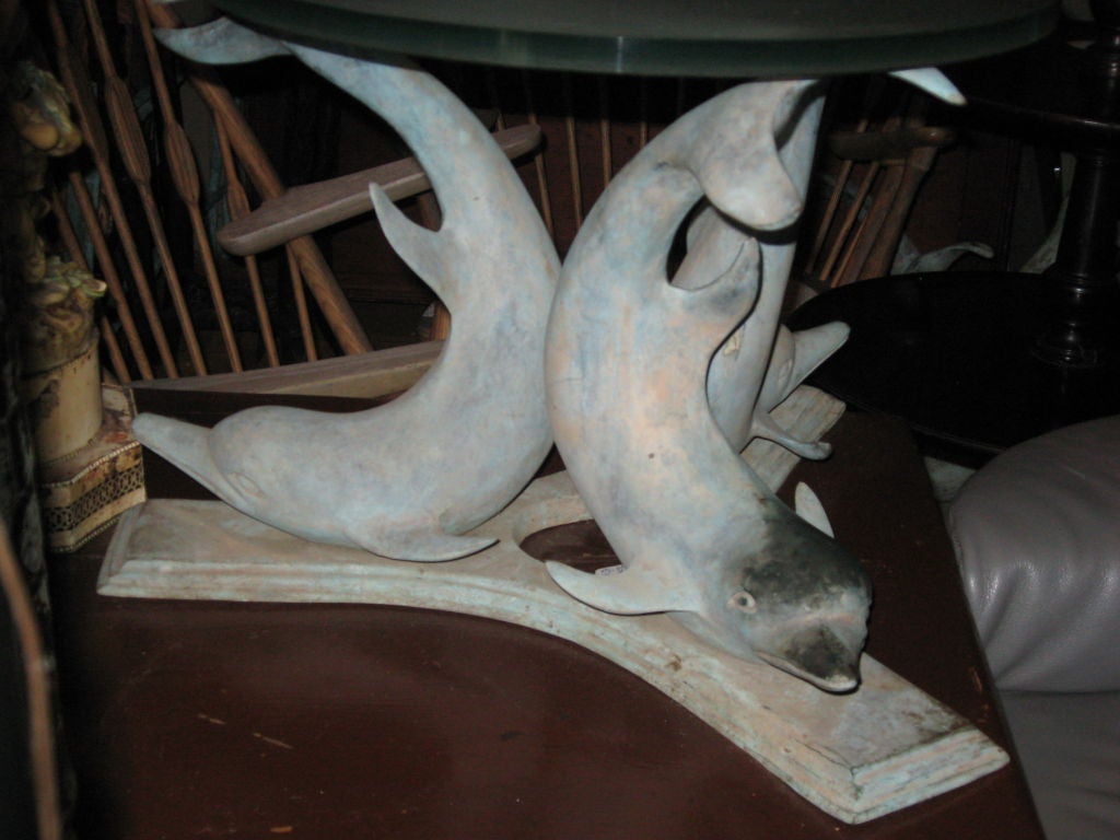 Pair of bronze dolphin bases-with excellent green patina, Hampton location.