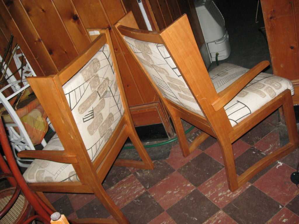 Pair of Midcentury fruitwood chairs with signed fabric.