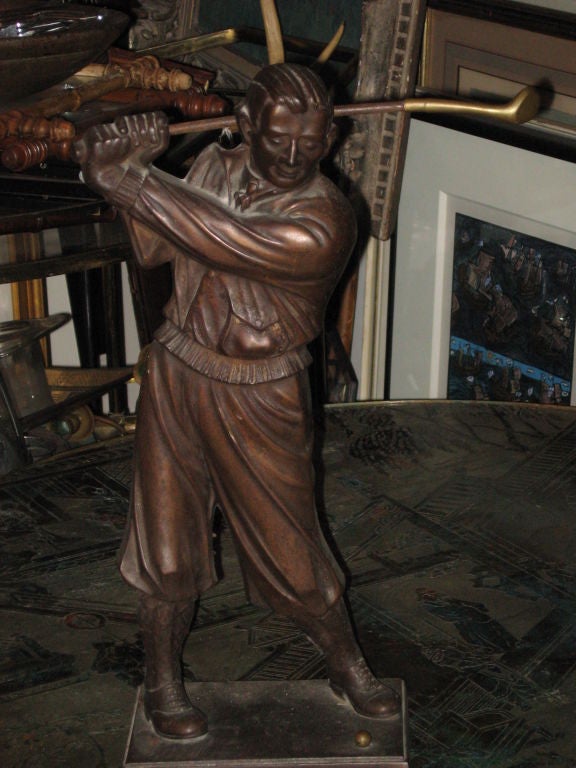 1920s iron and brass golfer fireplace tool holder.