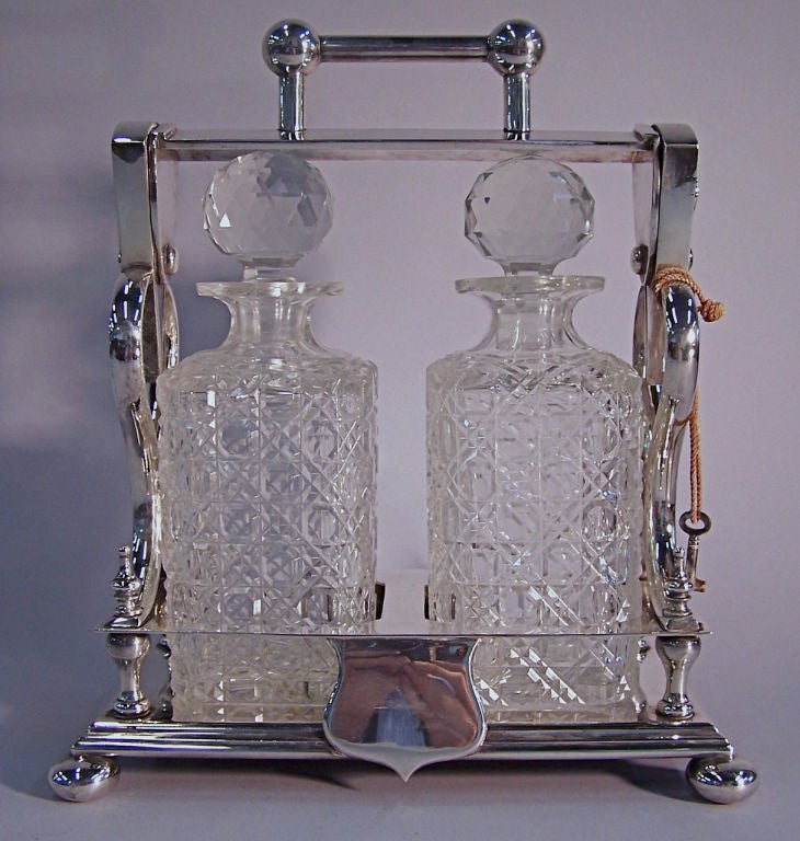 SilverPlate Tantalus Set with Two Crystal Decanters, c. 1900 at 1stDibs
